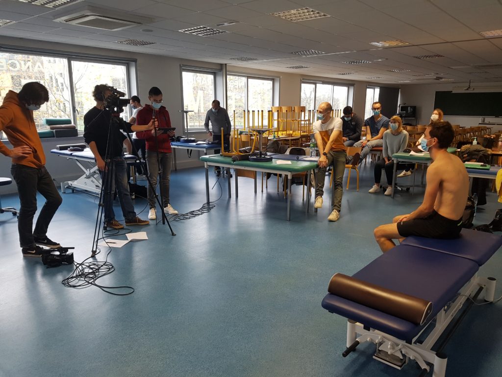Photograph of video filming of patient manipulation